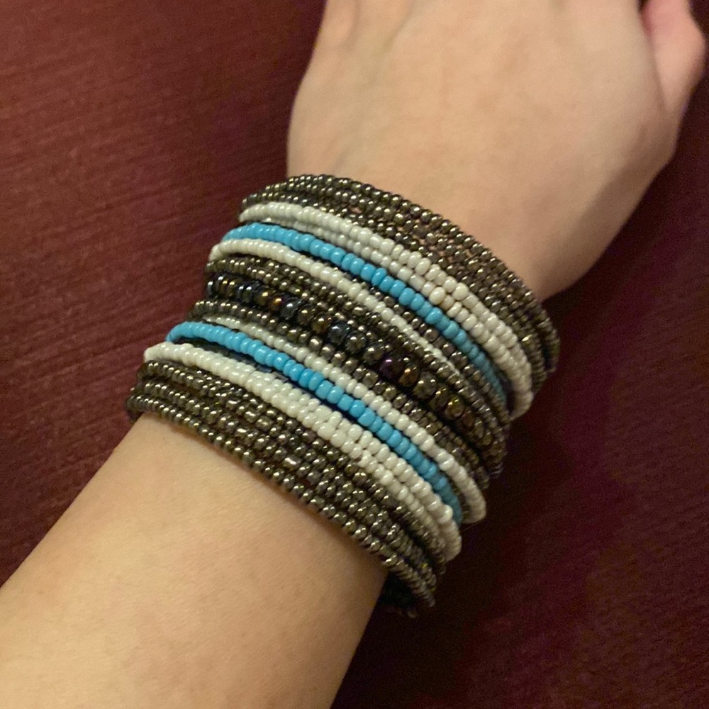 Layered beaded turquiose color wired bracelet